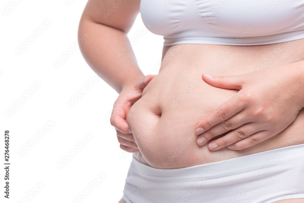excess fat on the stomach close up concept photo obesity and weight loss excess fat on the stomach close up concept photo obesity and weight loss