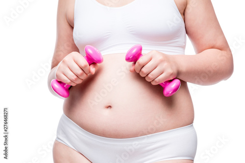 Wallpaper Mural slimming woman concept in white underwear with pink dumbbells, fat belly closeup Torontodigital.ca