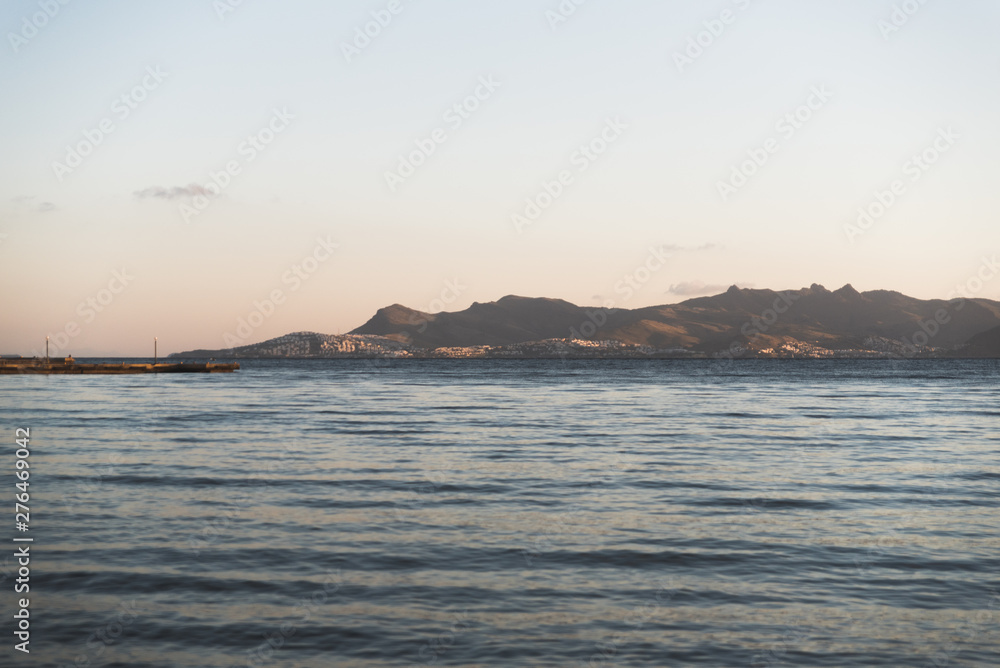 Landscape view of Kalymnos, Greece across the Aegean Sea seen from Kos, Greece. 