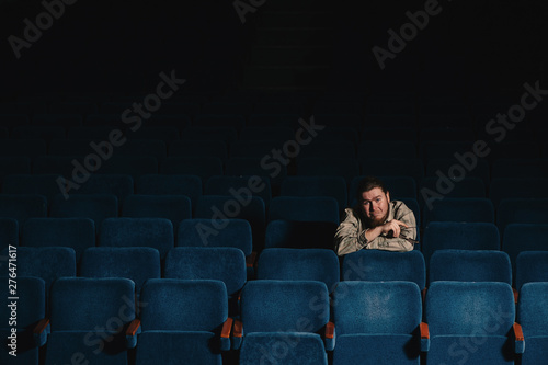Tableau sur toile Director by one in dark theater hall