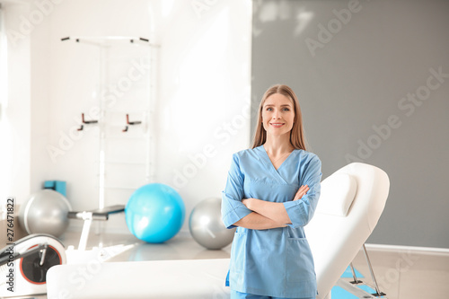 Female physiotherapist in rehabilitation center photo