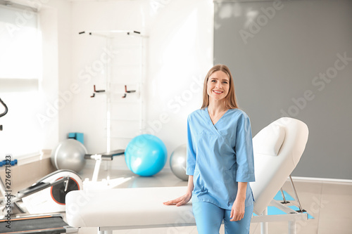 Female physiotherapist in rehabilitation center photo