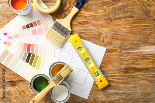 Cans of paint with supplies...