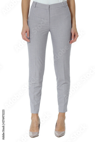 summer gray cotton trousers on model legs with white stiletto heels