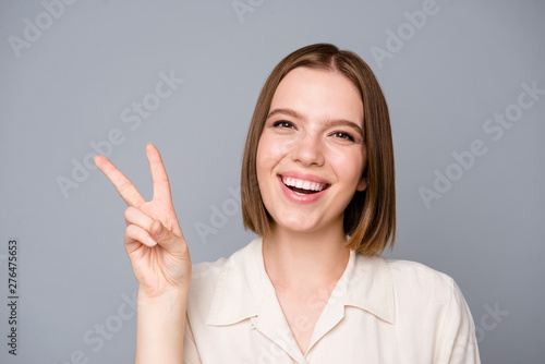 Wallpaper Mural Close up photo of content optimistic youth make v-sign look have free time holidays summer isolated dressed blouse fashionable clothes modern outfit isolated grey background Torontodigital.ca
