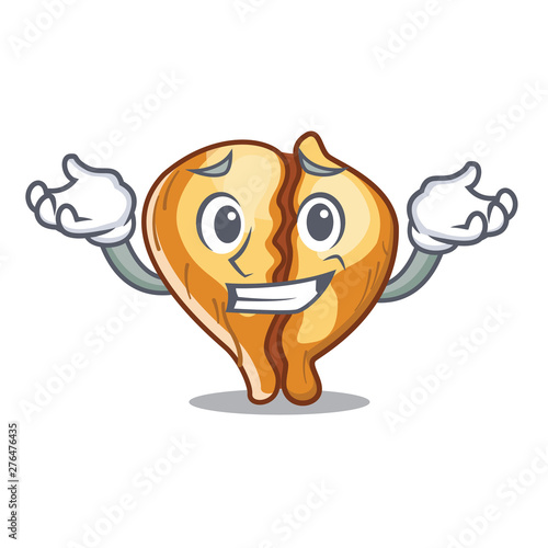 Grinning tortellini is cooked in cartoon pan