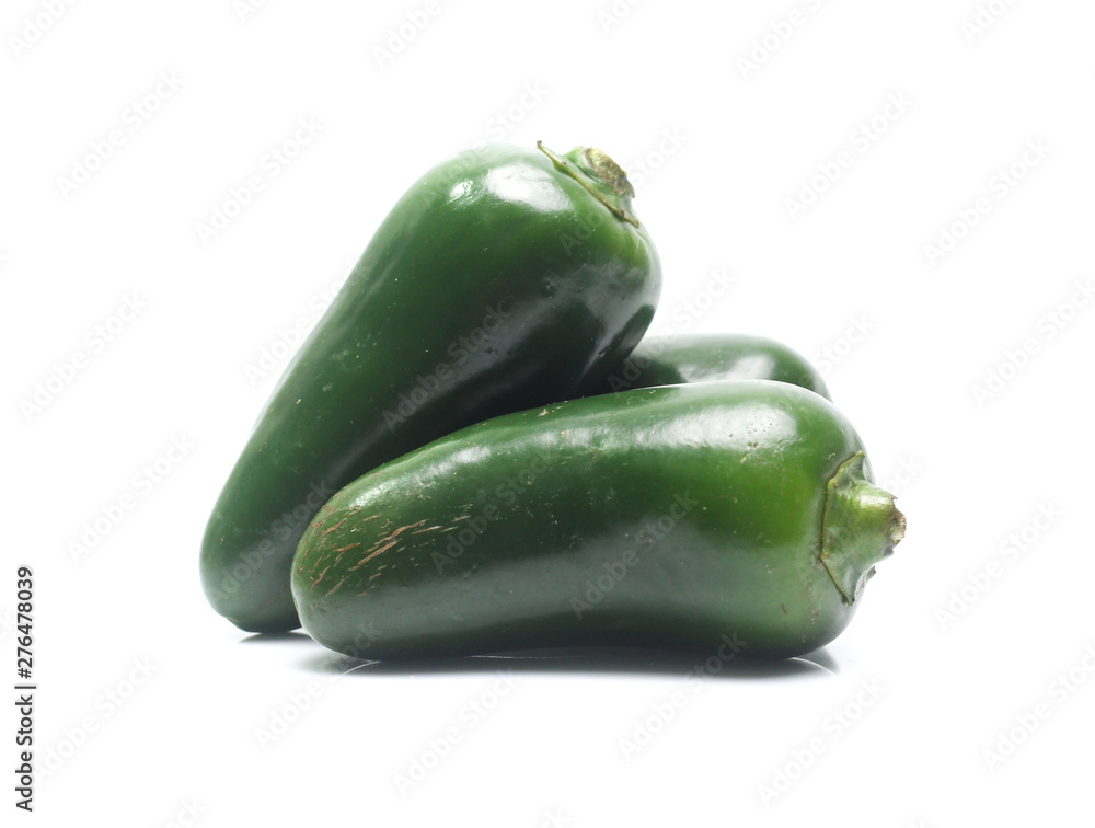 green chilies on white background (jalapeno) green chilies on white background (jalapeno)