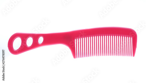 Pink comb isolated on white background