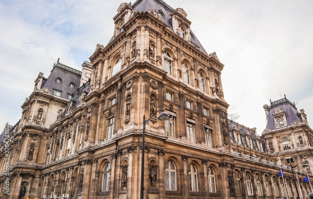 Paris / France - April 06 2019: Beautiful facade of historic building. Hotel de Ville, the Municipality of Paris