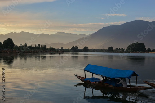 Shikara boats on Dal Lake with Sunset Dal Lake in Srinagar Jammu and Kashmir state India © khlongwangchao