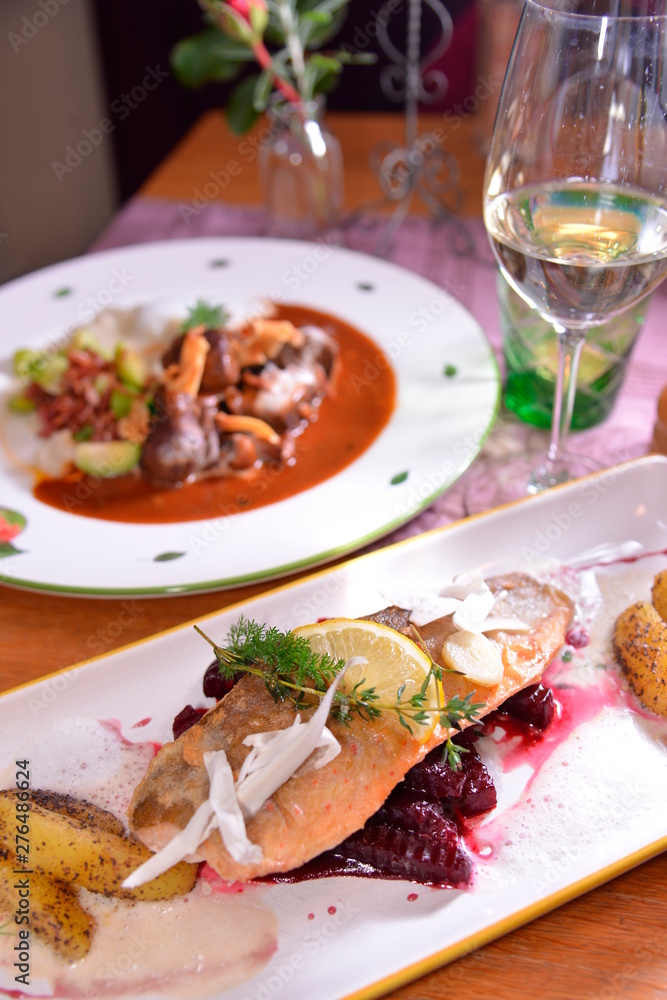 Close up of the fried fish with decoration; restaurant;dining-room;Joching;Weingut Holzapfel;Vienna;Austria Close up of the fried fish with decoration; restaurant;dining-room;Joching;Weingut Holzapfel;Vienna;Austria