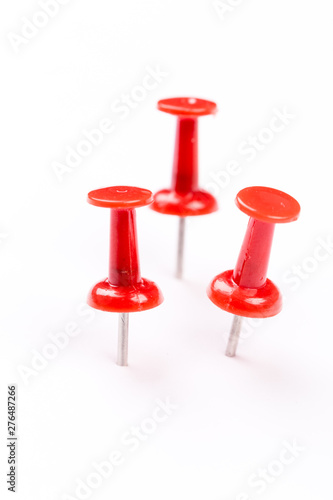 Push red pins isolated on white background.