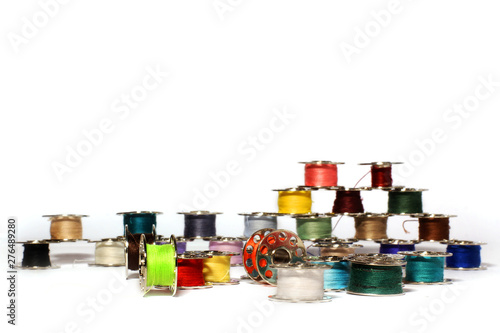 Spools of thread on a white background. For sewing