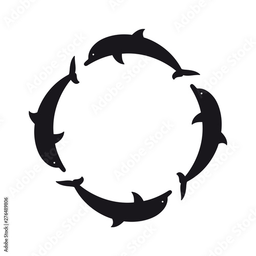 Vector black silhouette circle consisting of four dolphins.