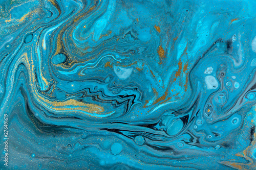 Blue and gold marbling pattern. Golden powder marble liquid texture. © anya babii