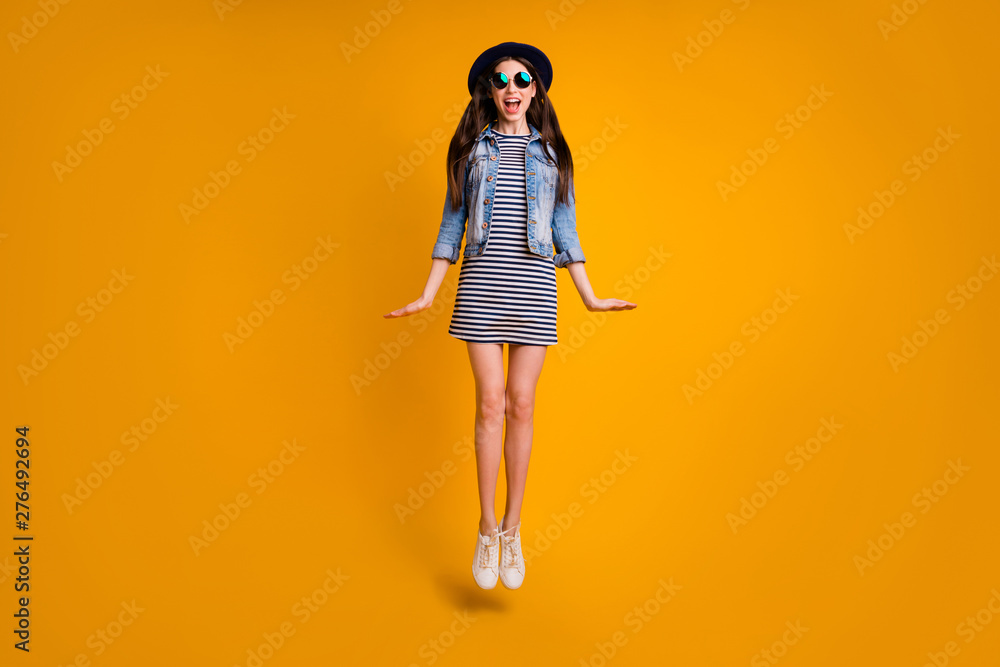 Full length body size view photo attractive cute charming people millennial free time summer travel specs satisfied striped jeans denim outfit fashionable scream laughter isolated yellow background Full length body size view photo attractive cute charming people millennial free time summer travel specs satisfied striped jeans denim outfit fashionable scream laughter isolated yellow background