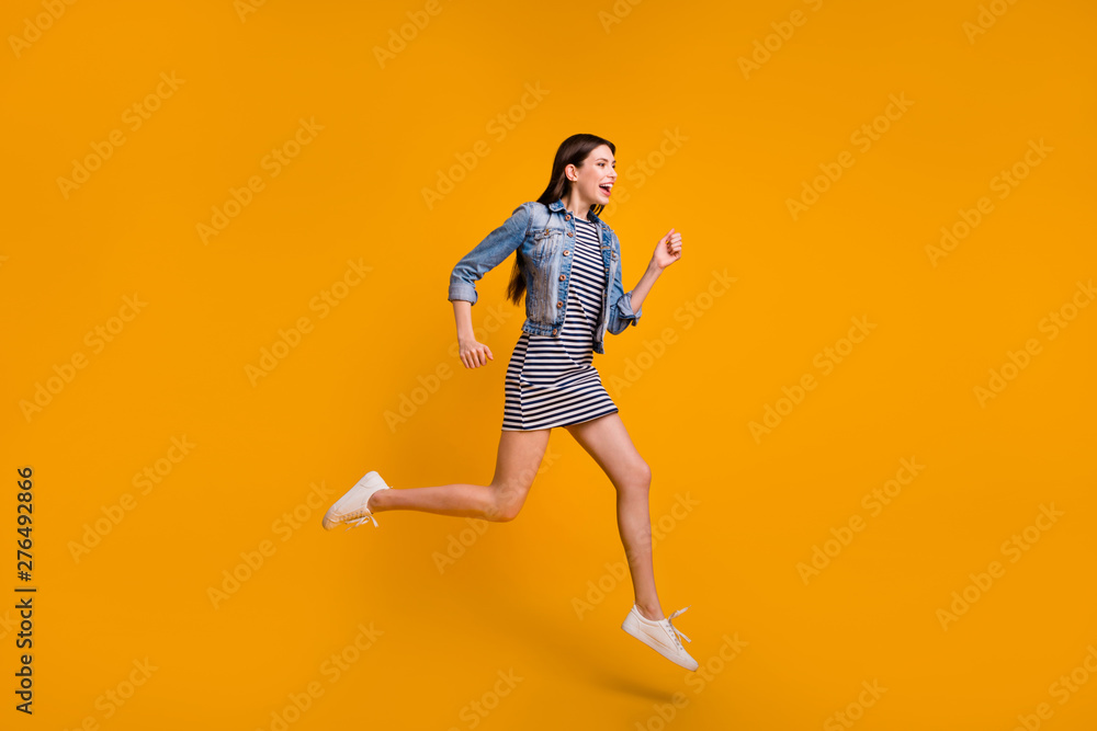 Full length body size view photo of energetic nice people person hurry holidays travel good-looking scream shout dressed fashionable denim spring clothing isolated yellow background