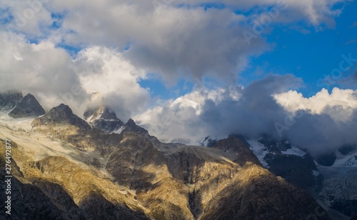 Fototapeta Naklejka Na Ścianę i Meble -  High mountains and clouds