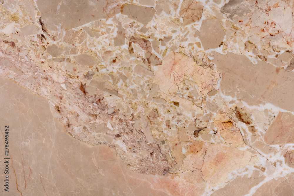 Obraz premium Abstract spots of different shapes and sizes of yellow color on a marble slab. Separate bathroom. The texture of natural marble.