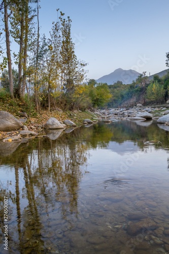 Autumn trees reflections in a lake