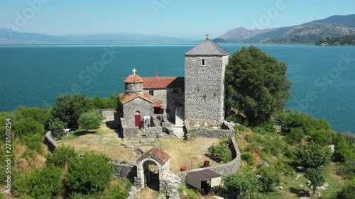 Wallpaper Mural Very beautiful views of Lake Skadar in Montenegro taken from drone. Moračnik Monastery  is a Serbian Orthodox monastery on Moračnik island on Skadar Lake in modern-day Montenegro. It is positioned acr Torontodigital.ca