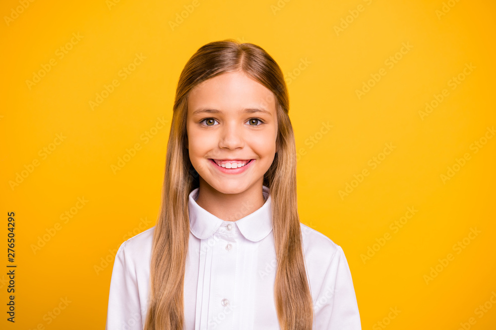 Close-up portrait of her she nice-looking attractive winsome pretty cheerful cheery straight-haired preteen girl isolated over bright vivid shine yellow background