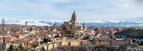 A panoramic view of the city of Segovia with it's tallest cathedral in Spain and city walls photo