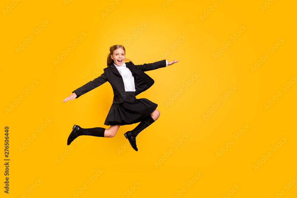Full body photo of charming stylish trendy kid raise arms hands scream shout laughing isolated over yellow background
