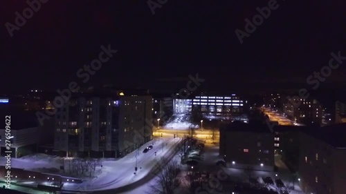 Wallpaper Mural Night aerial drone shot. Flying over the city. Building lights. Torontodigital.ca
