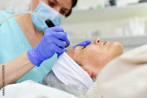 Woman receiving Hydrodermabrasion Facial therapy