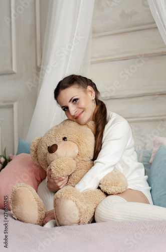 young woman with teddy bear