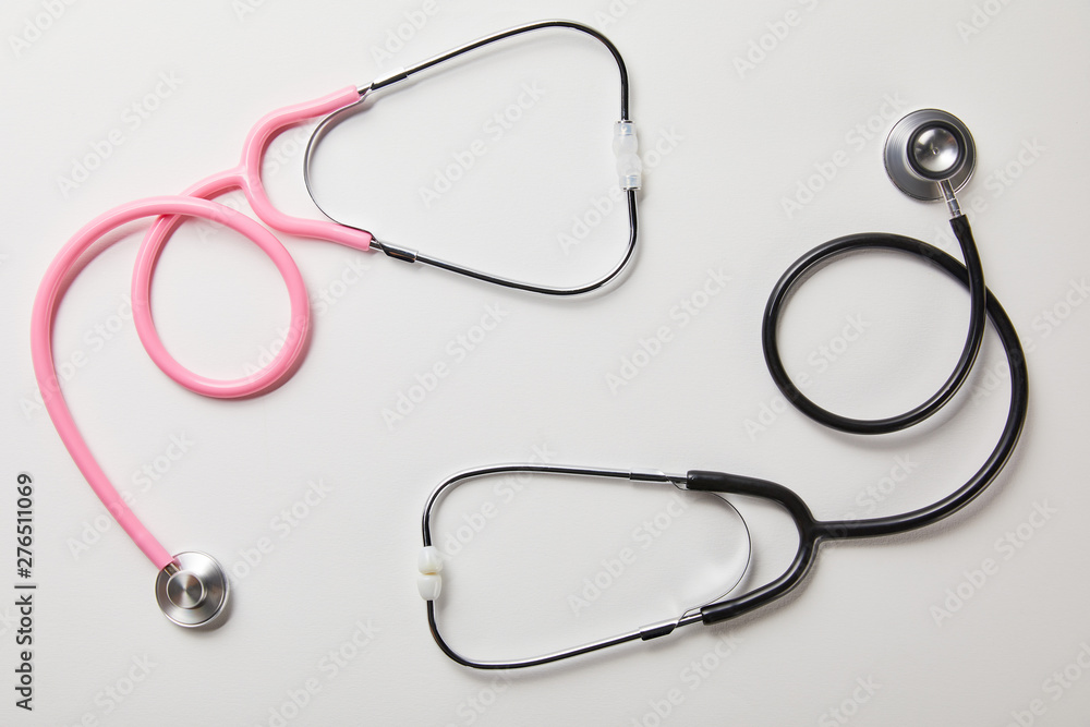 top view of two medical stethoscopes isolated on white top view of two medical stethoscopes isolated on white