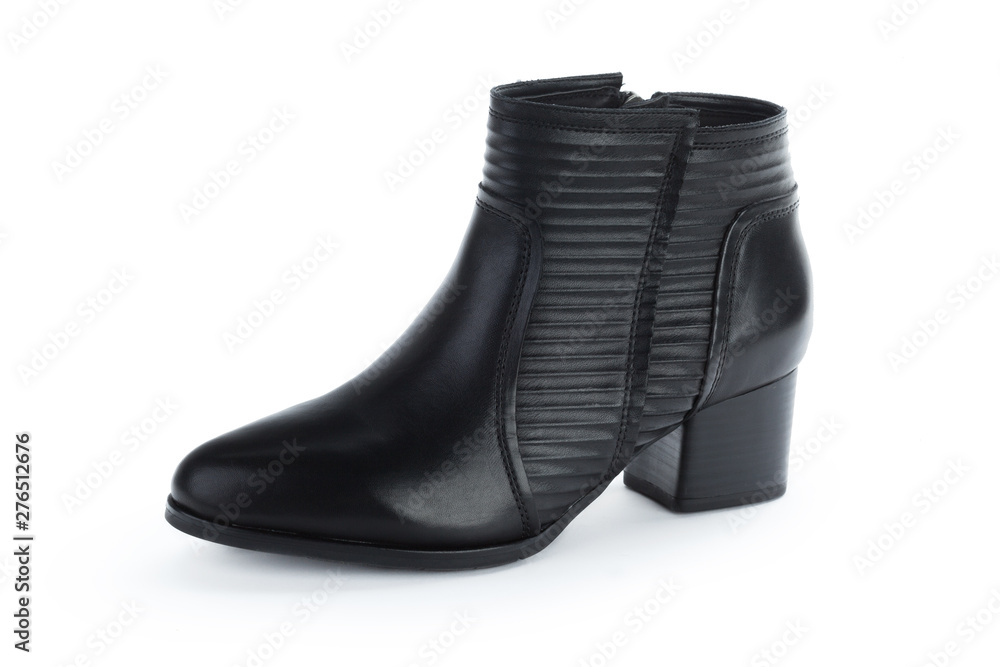 Female autumn-winter leather ankle  boots isolated on white background