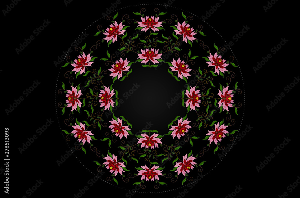 Round frame of beads and embroidered stylized flowers with red and pink petals on twisted branches with leaves on black background