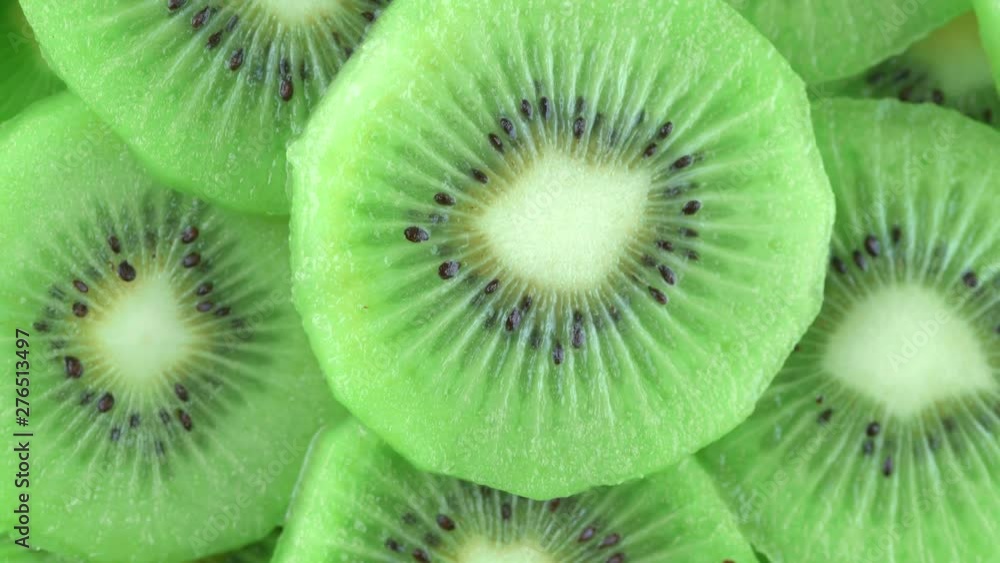 macro rotation video shooting of slice kiwi fruit .Close up flesh of kiwi.