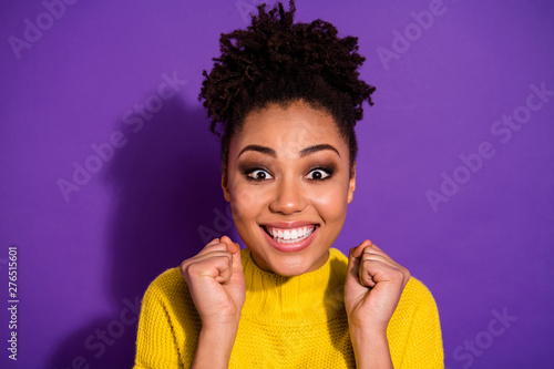 Close up photo of charming teen teenager raise fists wear colorful sweater isolated over purple background photo