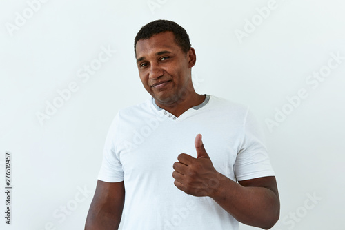 Sarcasm emotion African American man portrait against white background