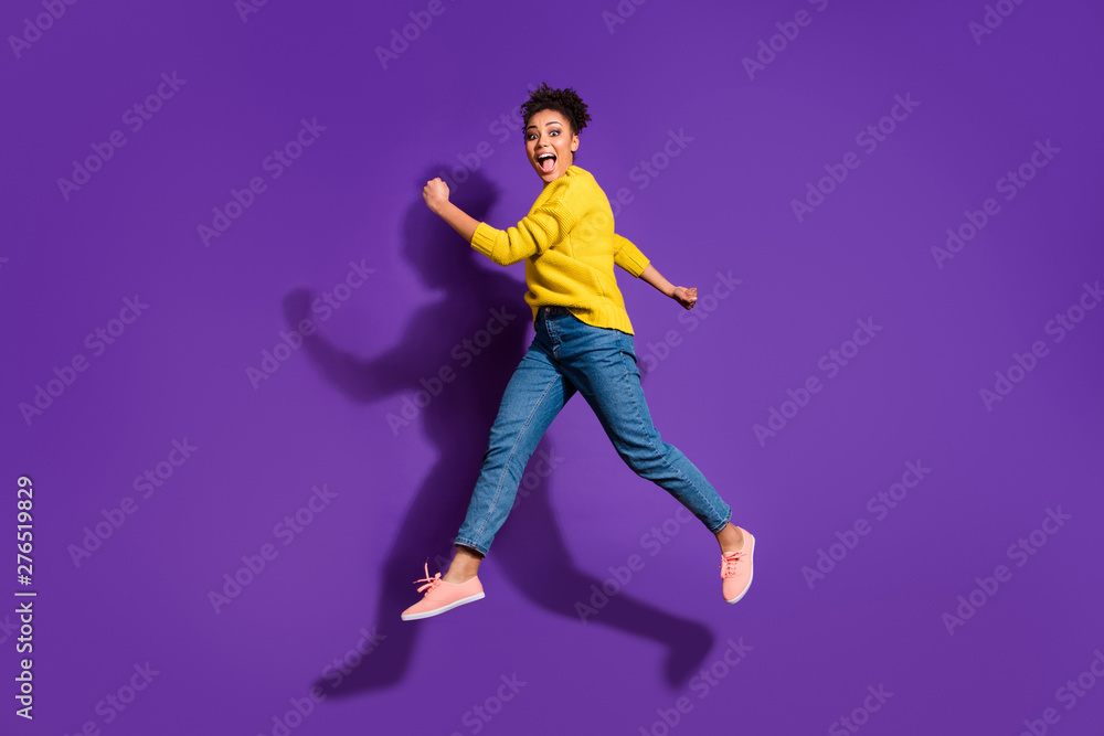 Full length body size profile side view portrait of her she nice attractive funny cheerful cheery ecstatic carefree wavy-haired girl having fun isolated over bright vivid shine violet background - obrazy, fototapety, plakaty 