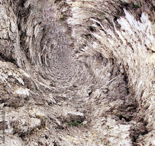 Fantasy tunnel drilled to the center of the earth photo