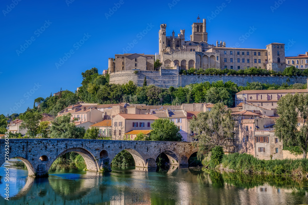 The Old Bridge (Pont Vieux) and St. Nazaire Cathedral in the city of Beziers, Herault, south of France