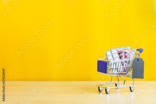 pills and drugs on shopping cart