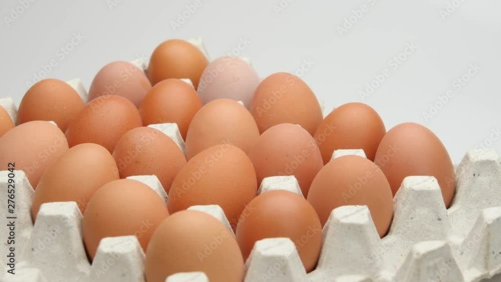 brown chicken eggs in cardboard box. brown chicken eggs in cardboard box.