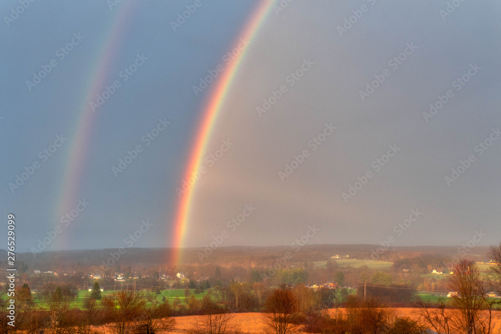 Fototapeta premium Beautiful Double Rainbow Over Countryside In Northwest Pennsylvania Venango Valley View