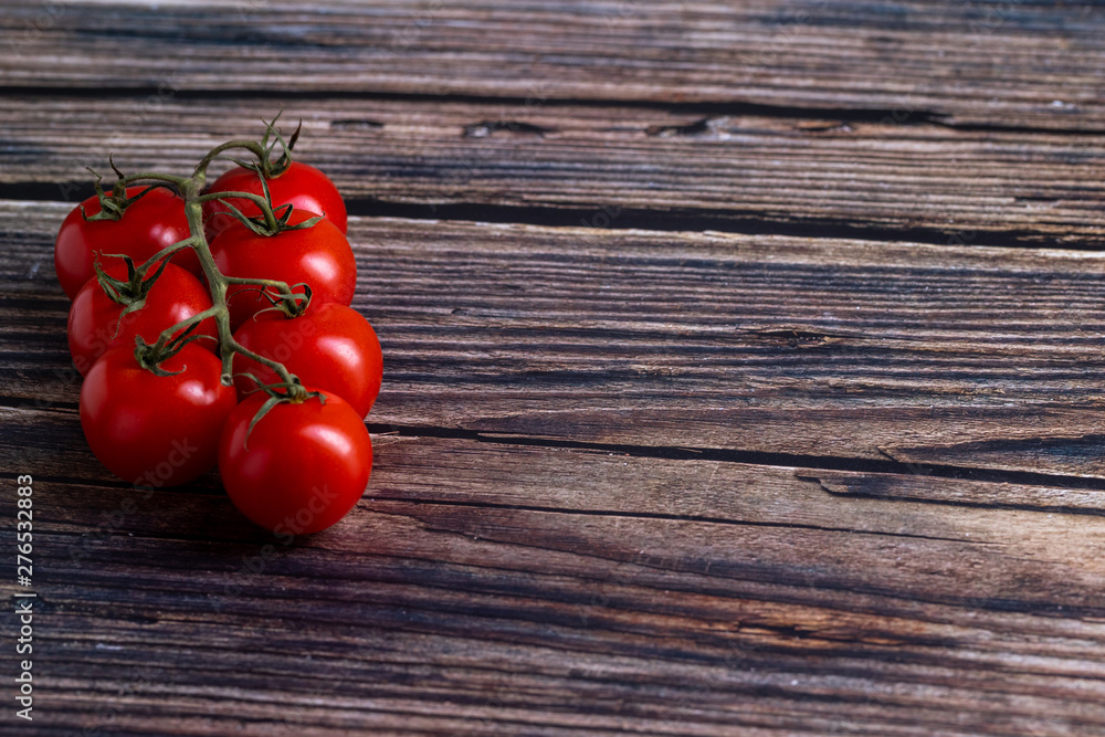 tomatoes on wooden board tomatoes on wooden board