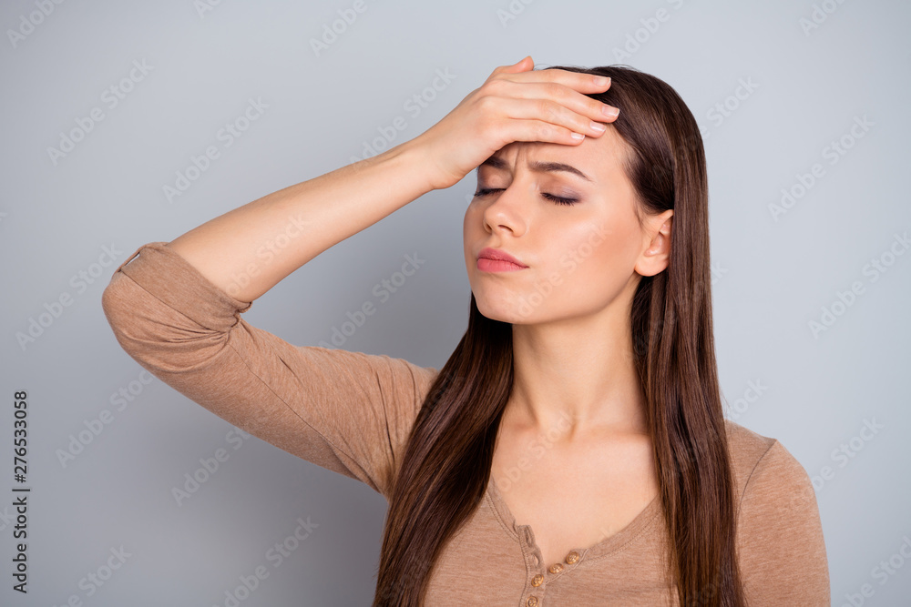 Close up photo beautiful sorrow she her lady eyes closed hands arms hold touch forehead check temperature suffer terrible head ache hurt wear casual pastel pullover sweater isolated grey background Close up photo beautiful sorrow she her lady eyes closed hands arms hold touch forehead check temperature suffer terrible head ache hurt wear casual pastel pullover sweater isolated grey background