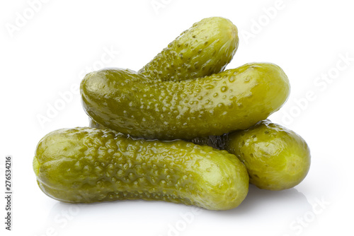 Slika na platnu Delicious marinated pickled cucumbers, isolated on white background