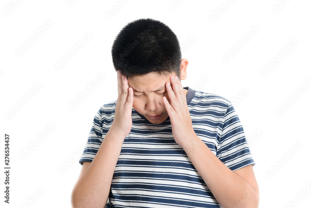 Asian preteen boy having headace on white background. Asian preteen boy having headace on white background.