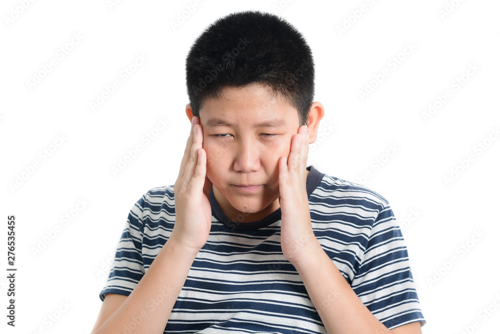 Asian preteen boy having headace on white background. Asian preteen boy having headace on white background.