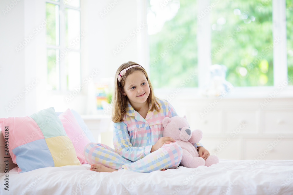 Child playing in bed. Kids room. Girl at home. Child playing in bed. Kids room. Girl at home.