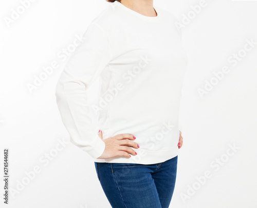 White pullover on a young woman in shorts closeup, isolated, with copy space, mockup.